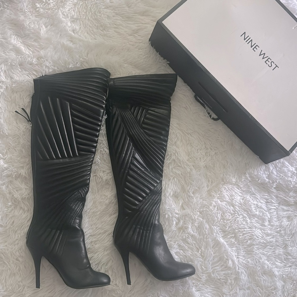 Black knee high boots. 6M